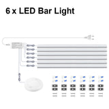 Alt Tag: Wireless Motion Sensor LED under cabinet light kit with 6 LED bar lights, power adapter, motion sensor, and mounting strips
