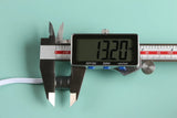 Alt Tag: IR Motion Sensor Switch size measurement with digital caliper showing 13.20 mm, 12V/24V hand wave soft on/off switch component