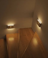 Alt Tag: Hands-Free LED Night Light smart glow wall lamp illuminating wooden staircase steps