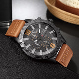men's luxury leather strap quartz watch with black round case and brown leather band, men's fashion wristwatch close-up