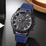 Alt Tag: men's luxury leather strap quartz watch with blue leather band, black round case, and multi-dial chronograph face